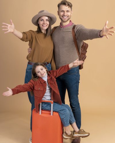 mother-father-with-daughter-luggage-ready-travel-scaled.jpg